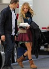 Blake Lively showing legs in a short skirt on the set of Gossip Girl